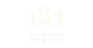Maison Routin 1883 logo na beloj pozadini