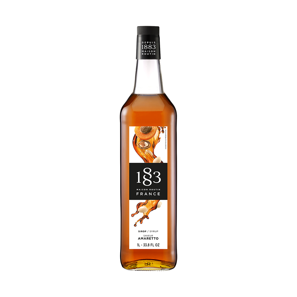 maison routin 1883 flaša sirupa ukusa amaretto na beloj pozadini